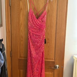 Lulus pink sequenced prom dress, adjustable back size medium, never worn.